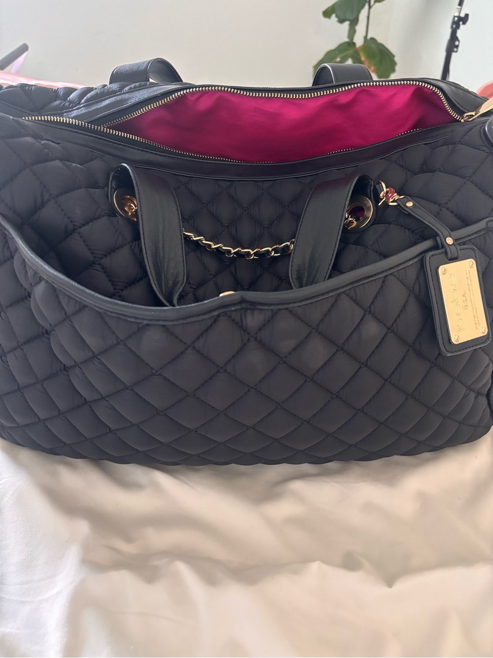 bebe Quilted Black Tote with Hot Pink Interior and Gold Hardware